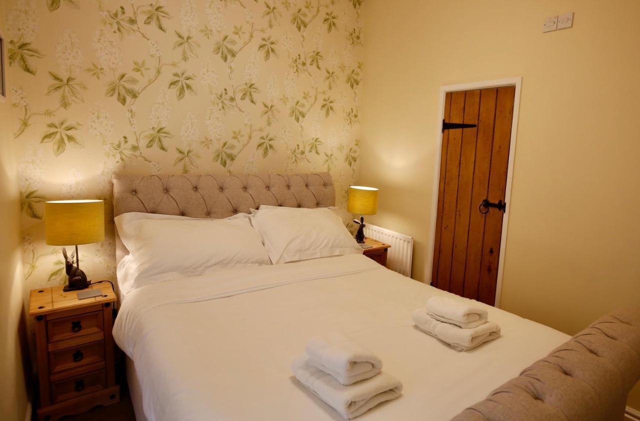 Отель Ashfield House Грассингтон Номер фото A bedroom at the Old Post Office
